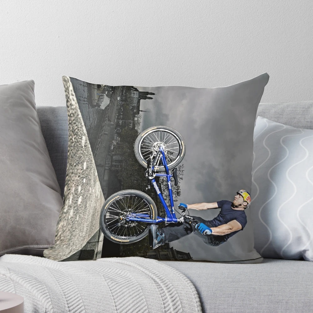 A plush pillow featuring the legendary trials rider Danny MacAskill and his signature tricks.