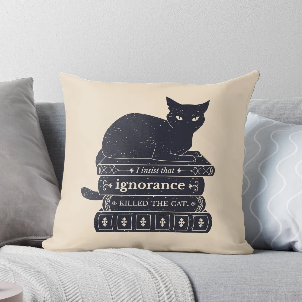 Dark academia-inspired pillow with a cat silhouette and the quote "Ignorance Killed the Cat"