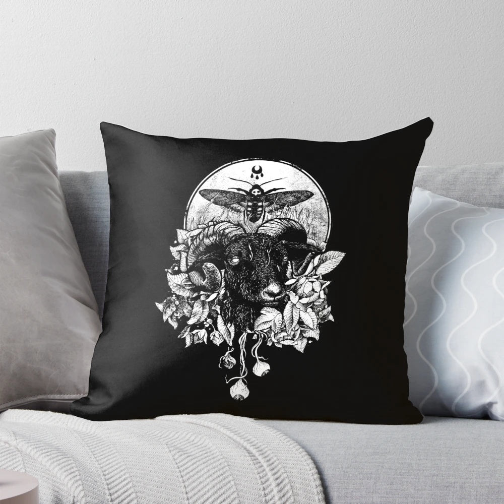 A dark, gothic-style pillow with occult and metal-inspired designs