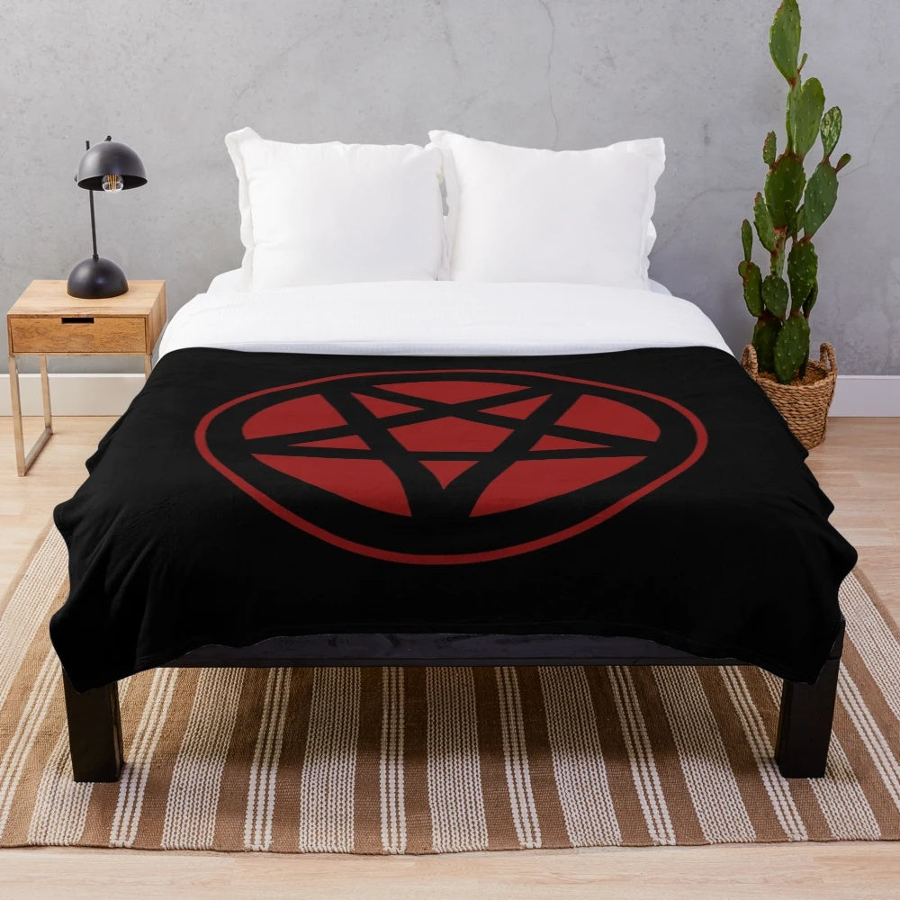 Dark red plush blanket with an inverted pentagram design, perfect for occult and gothic home decor