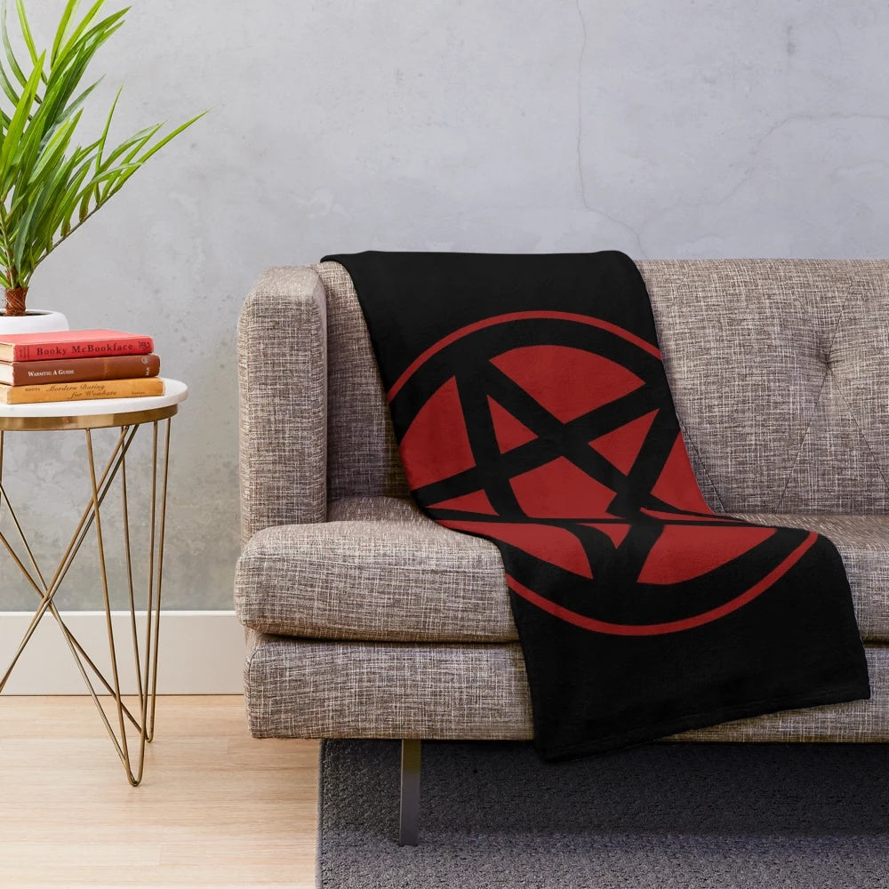 Dark red plush blanket with an inverted pentagram design, perfect for occult and gothic home decor
