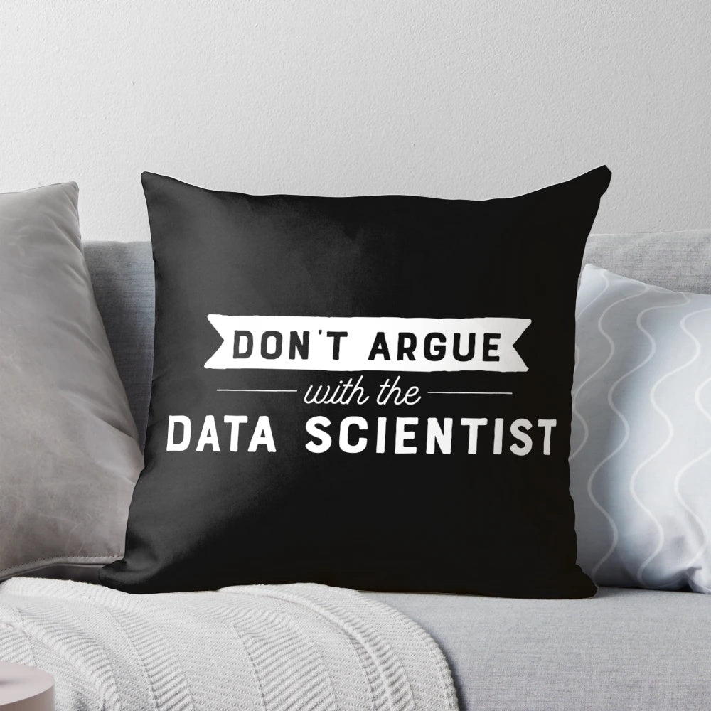 A white pillow with the text "Don't Argue With The Data Scientist" printed on it.