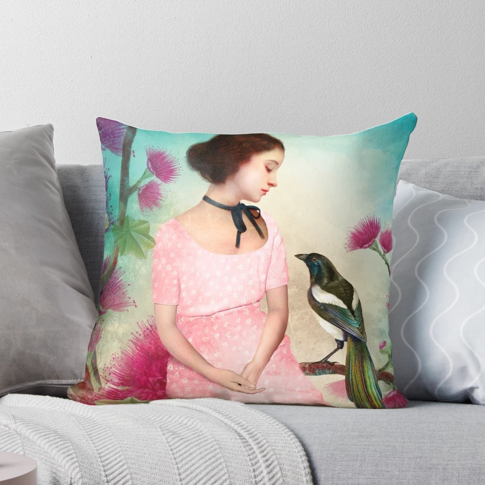 A soft, plush pillow featuring a dreamy, artistic design with a girl, bird, and nature elements.