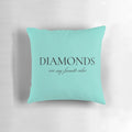 Decorative throw pillow with a diamond-inspired design in shades of blue and white.