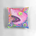 Vibrant pillow featuring a glitter-filled shark with mesmerizing eyes and teeth against a rainbow background
