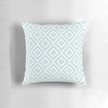 Decorative throw pillow featuring an abstract Aztec-inspired pattern in shades of duck egg blue and white.