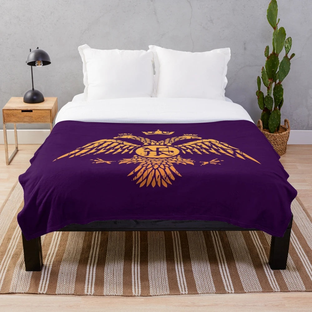 Plush blanket featuring a decorative Byzantine-inspired double-headed eagle symbol