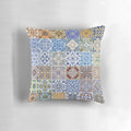 Pillow featuring a collage of colorful, abstract ceramic tile patterns inspired by traditional Portuguese azulejo design.