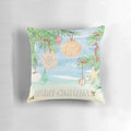 Coastal Christmas pillow with watercolor beach and sea design