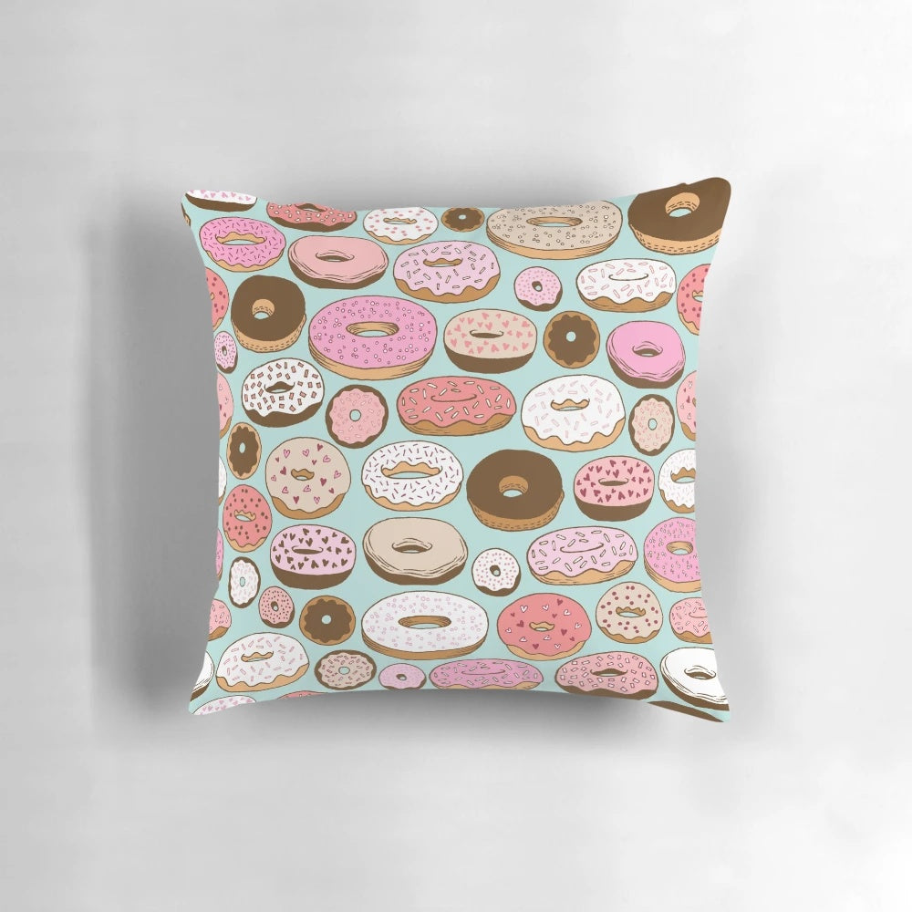 Vibrant aqua and teal donuts patterned decorative pillow for home decor