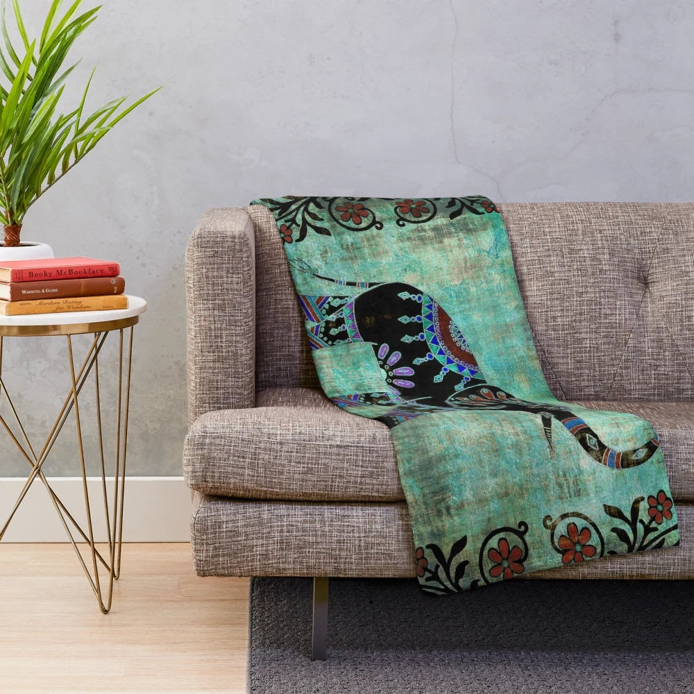 Decorative elephant plush blanket with intricate floral and asian art design
