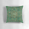 Malachite and gold lotus flower of life mandala design on a decorative throw pillow.