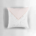 Decorative geometric marble pillow in blush pink and rose gold hues
