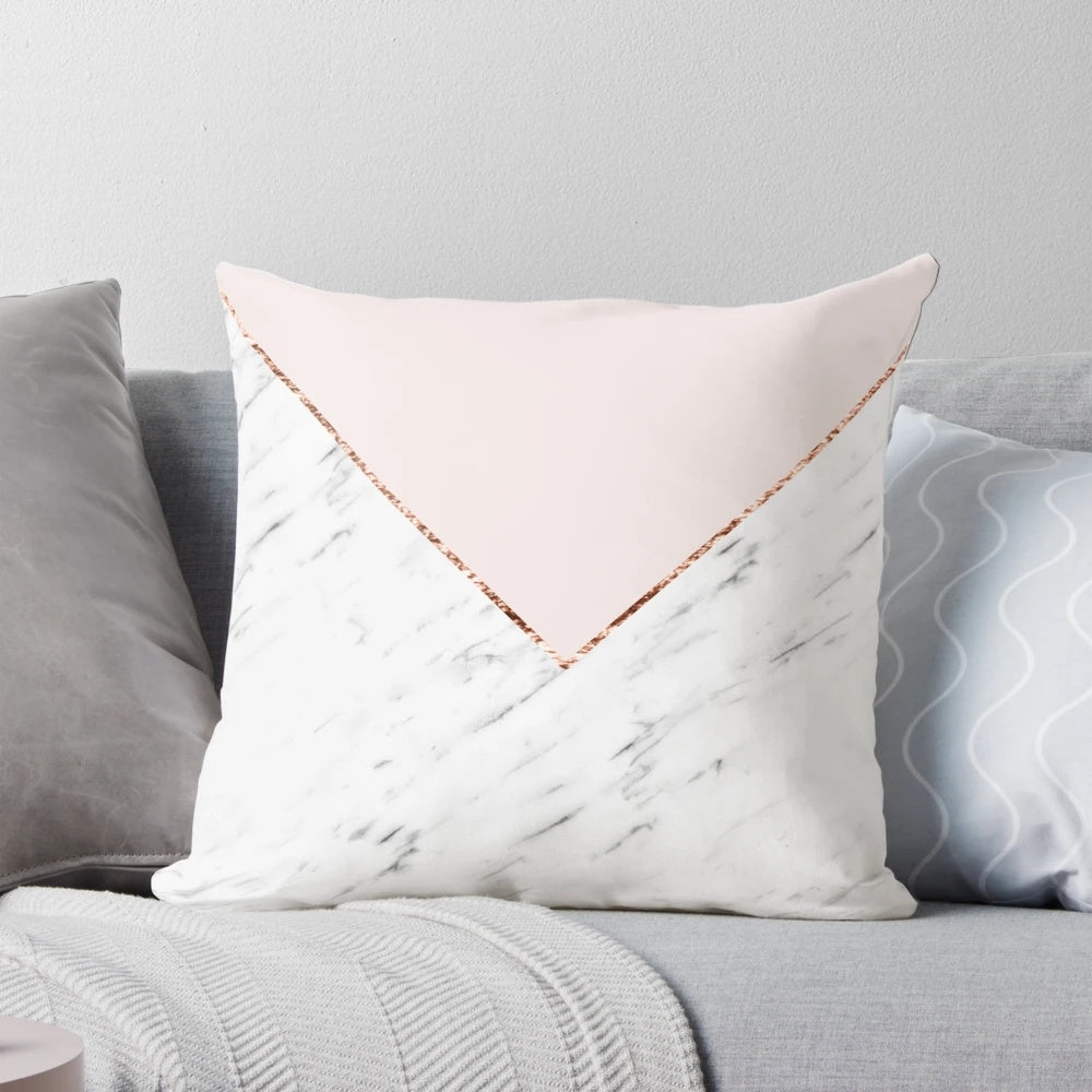 Decorative geometric marble pillow in blush pink and rose gold hues