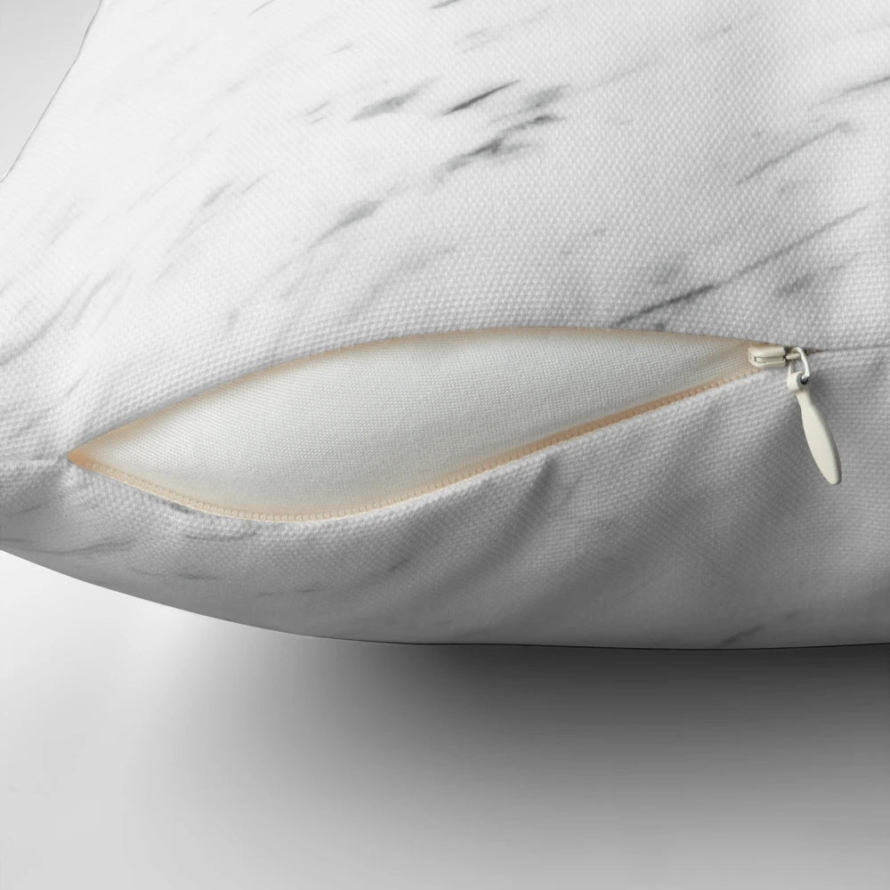 Decorative geometric marble pillow in blush pink and rose gold hues