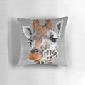 A soft, grey pillow with a charming giraffe design, perfect for adding a touch of nature to your home.