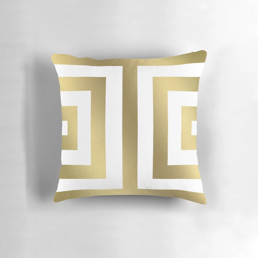 Decorative gold and white striped pillow with a bold, modern design