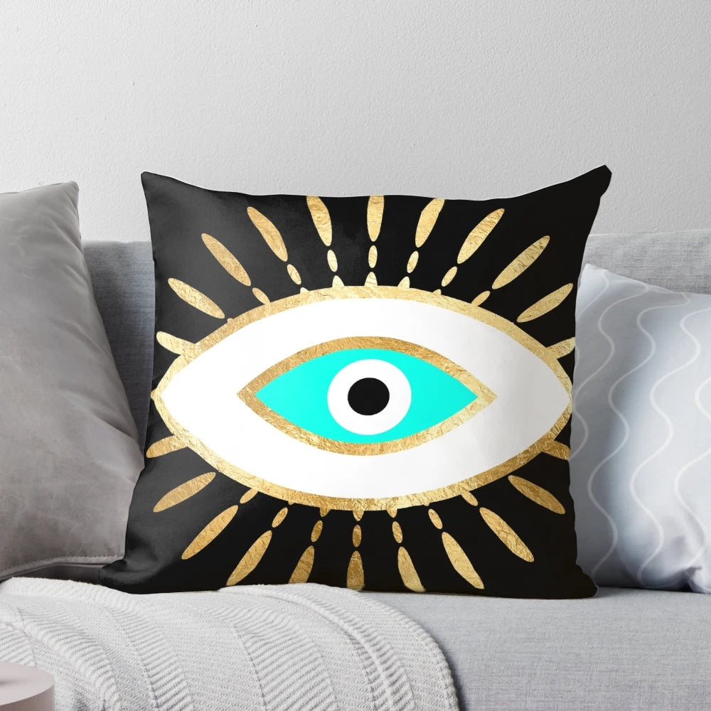 Decorative hamsa hand and evil eye gold foil print throw pillow, a spiritual amulet for good luck and protection.