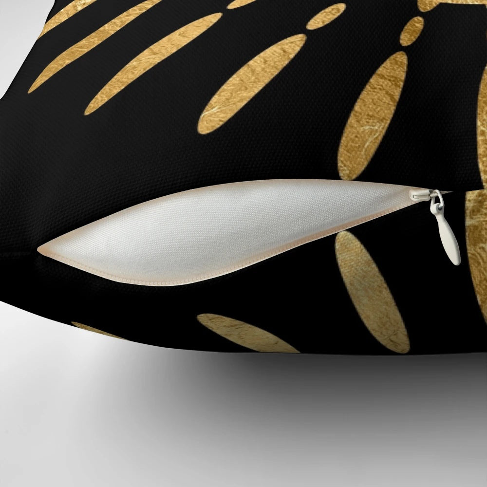 Decorative hamsa hand and evil eye gold foil print throw pillow, a spiritual amulet for good luck and protection.