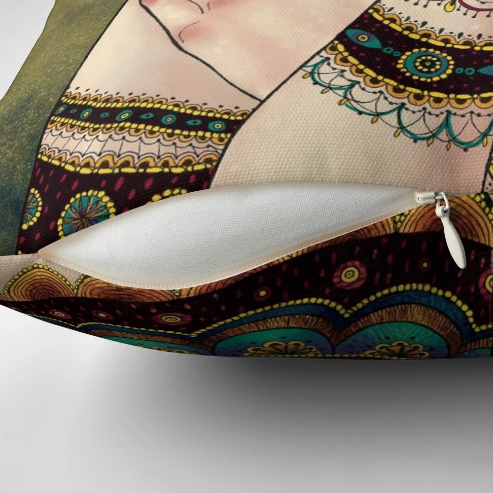A decorative throw pillow featuring the iconic Klimt muses painting with vibrant colors and patterns.