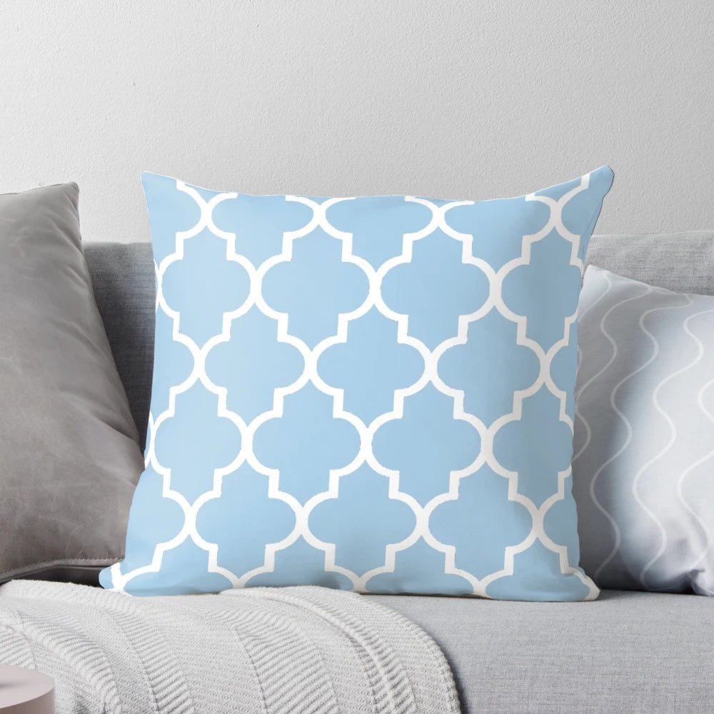 Moroccan-inspired quatrefoil pattern decorative throw pillow in light blue and white