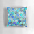Decorative Moroccan tile pattern pillow in cobalt blue, aqua, and gold colors