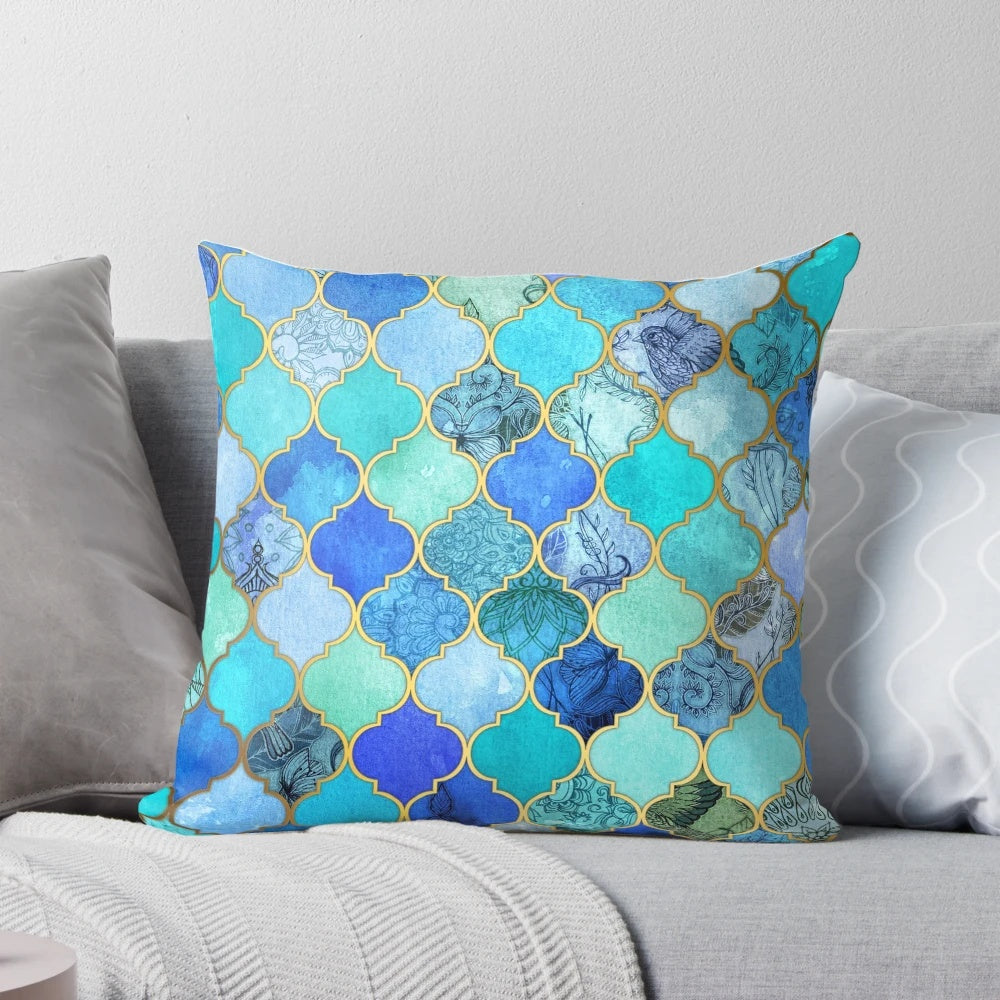 Decorative Moroccan tile pattern pillow in cobalt blue, aqua, and gold colors