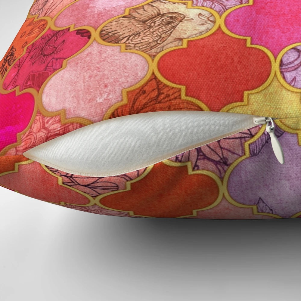 Decorative Moroccan tile pattern pillow in vibrant colors of hot pink, gold, tangerine, and taupe