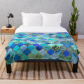 Decorative Moroccan tile pattern plush blanket in cobalt blue, aqua, and gold