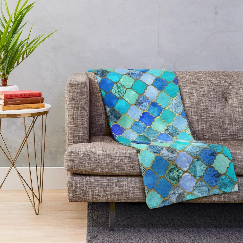 Decorative Moroccan tile pattern plush blanket in cobalt blue, aqua, and gold