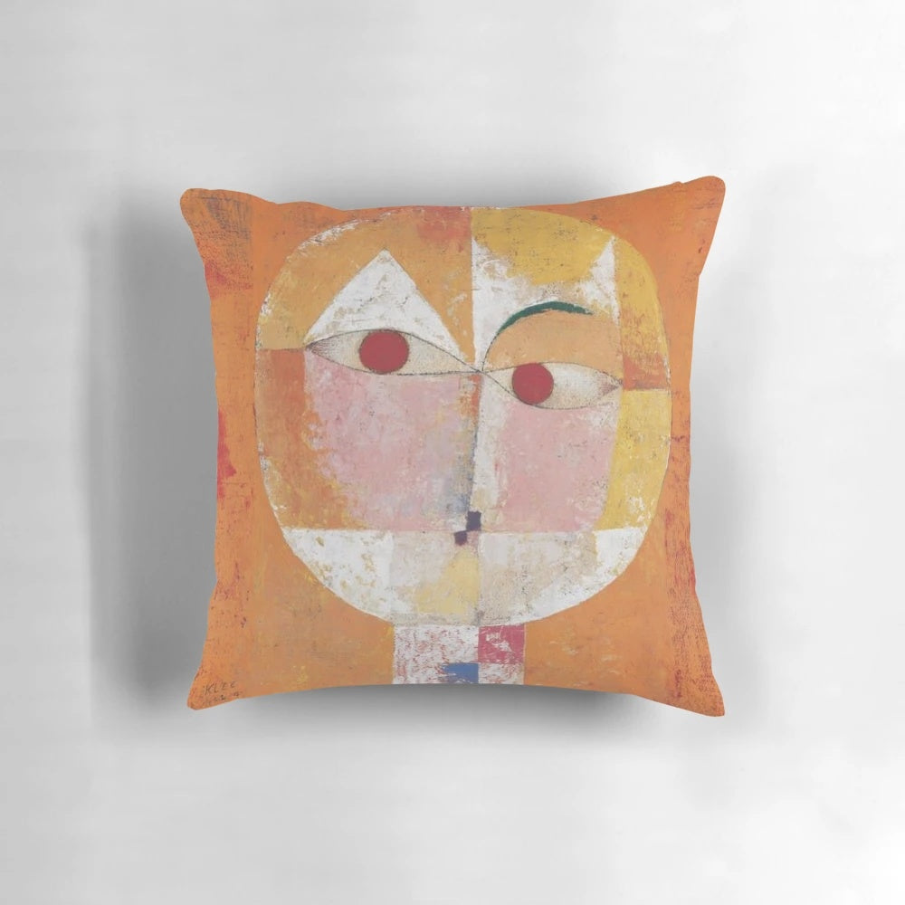 Throw pillow featuring the abstract art painting "Senecio" by artist Paul Klee