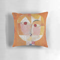 Throw pillow featuring the abstract art painting "Senecio" by artist Paul Klee