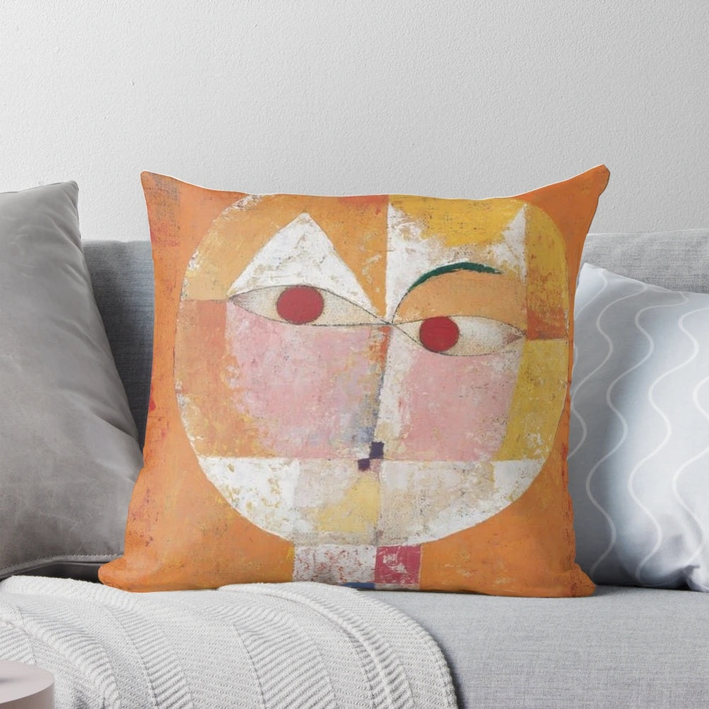 Throw pillow featuring the abstract art painting "Senecio" by artist Paul Klee