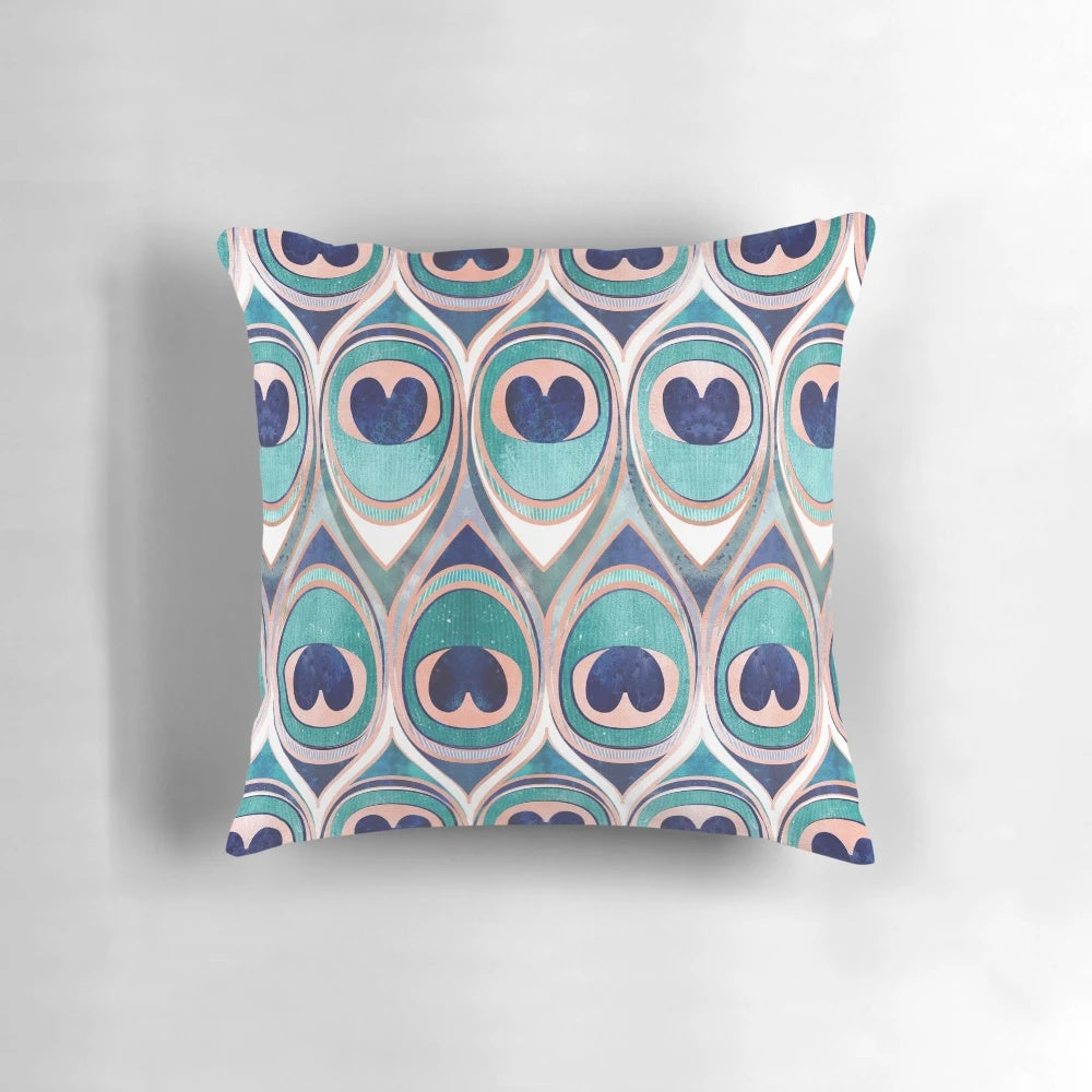 Teal blue and coral peacock feather patterned decorative pillow with metal texture