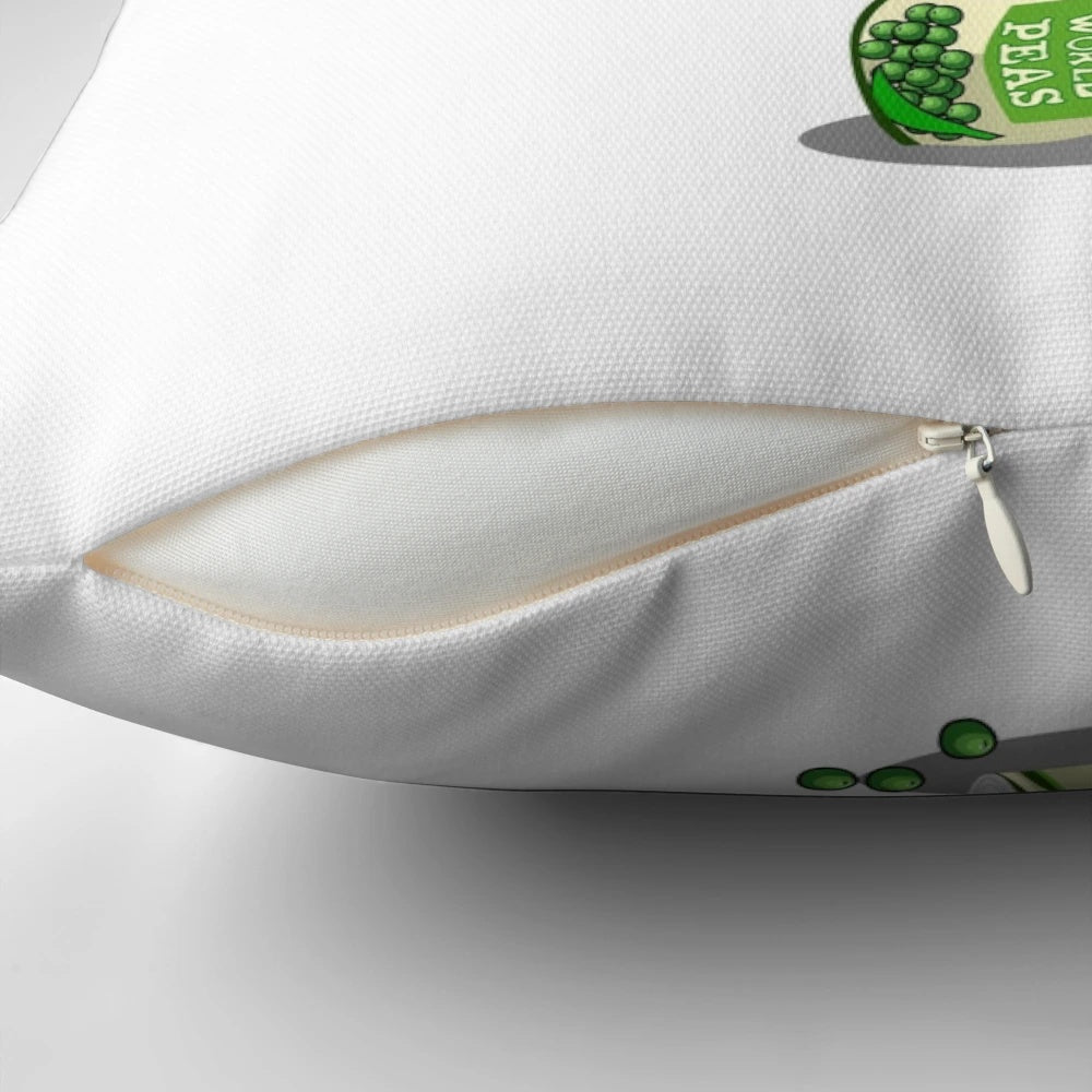 Decorative pillow with 'World Peas' pun design, featuring green peas and the text 'World Peace