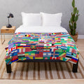 Multicolor plush blanket featuring flags of the world