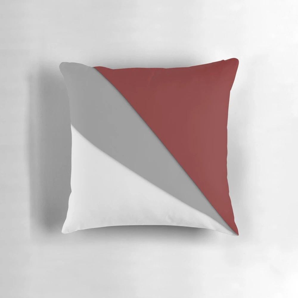 Decorative red and gray abstract pattern pillow, adding style and elegance to your home.