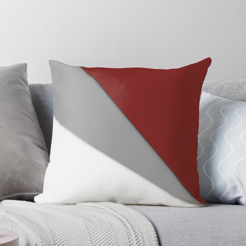 Decorative red and gray abstract pattern pillow, adding style and elegance to your home.