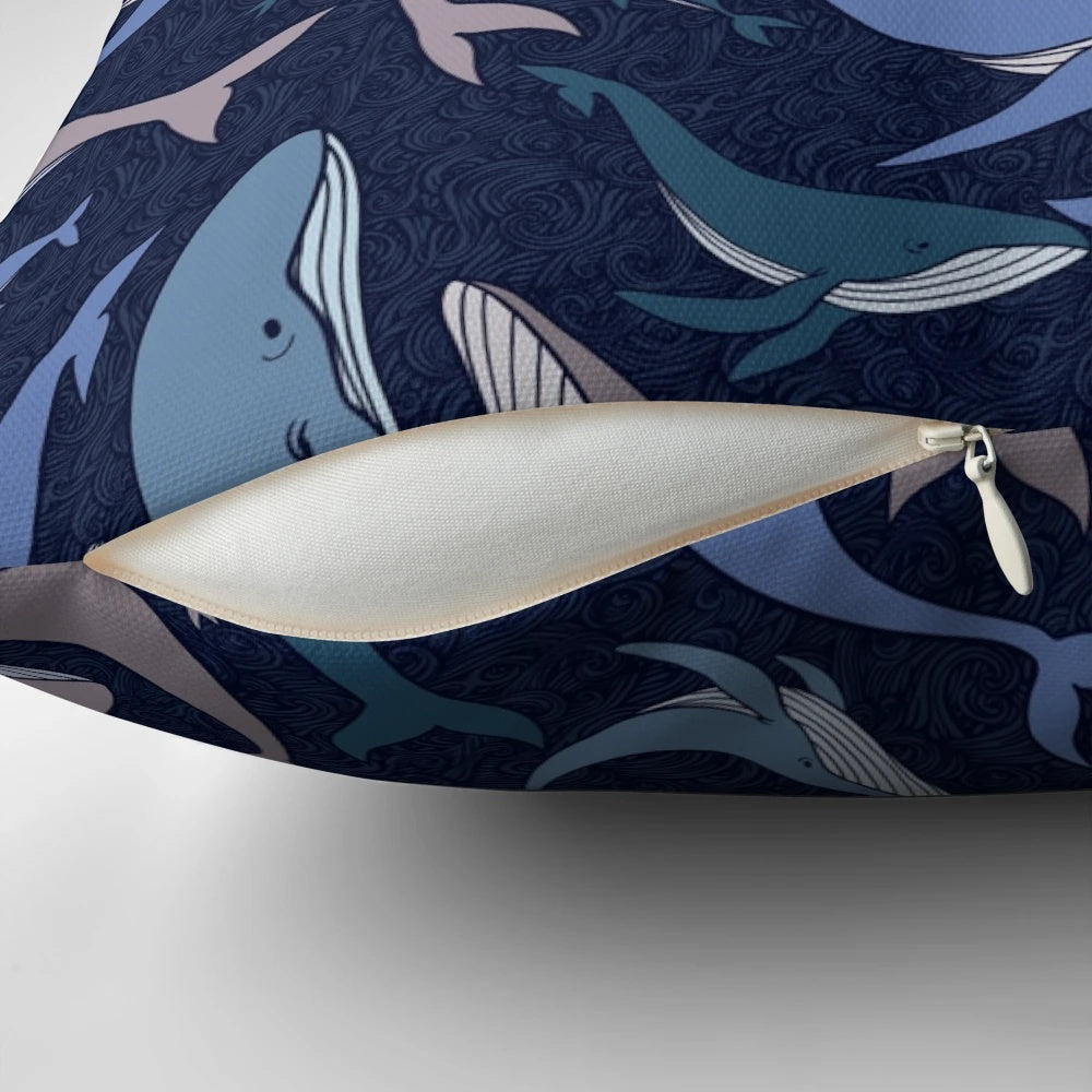 A decorative pillow featuring a school of whales in an abstract, underwater scene with a seamless pattern.