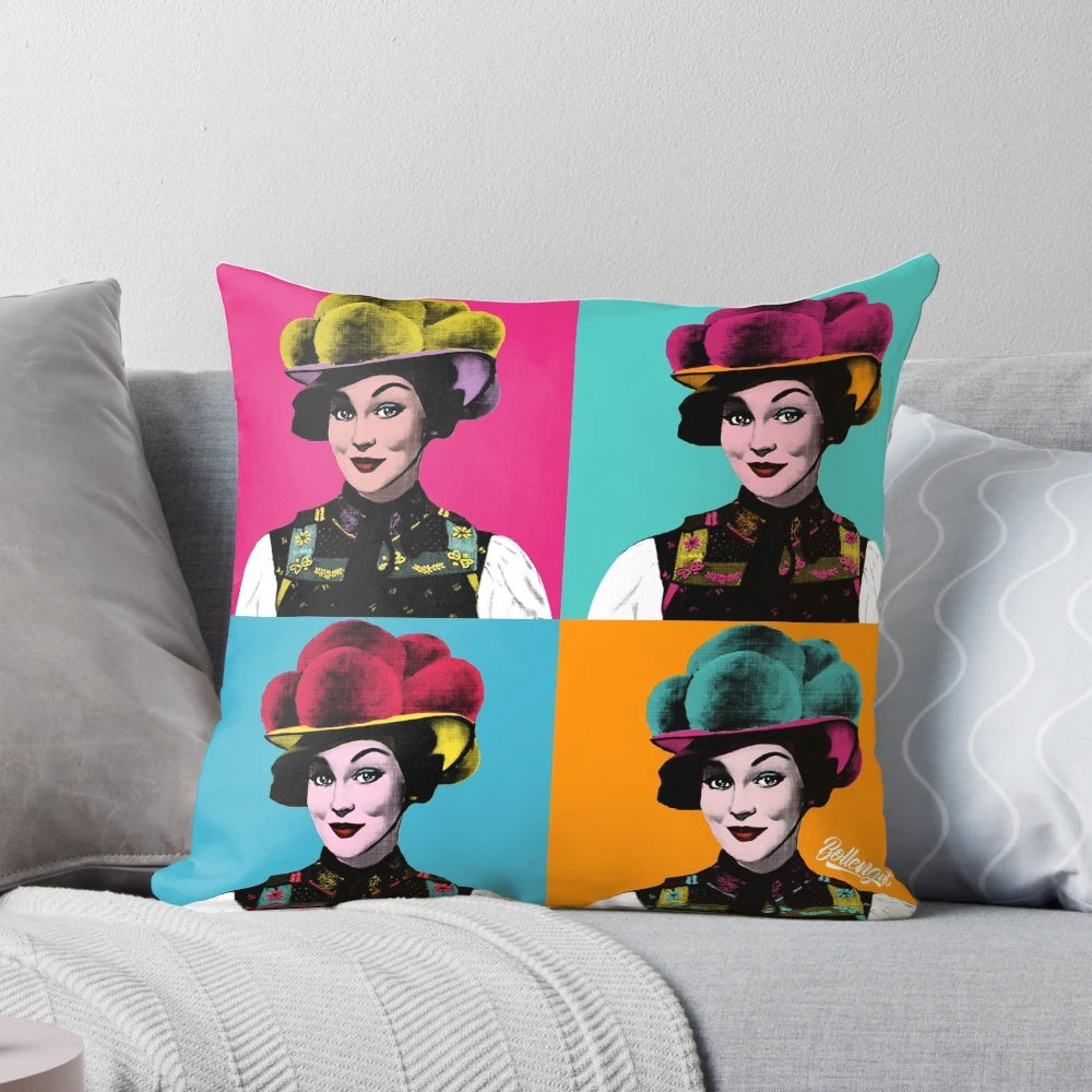 A decorative pillow featuring a pop art design of a Schwarzwaldmädel wearing a traditional Bollenhut from the Black Forest region.