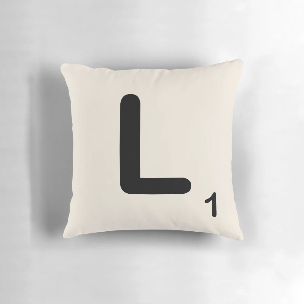 Scrabble Tile L Pillow featuring a large letter L design in a vintage Scrabble font