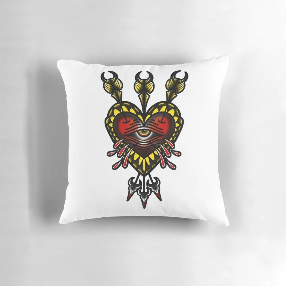 Graphic tattoo-inspired heart and arrow design printed on a soft, decorative pillow.
