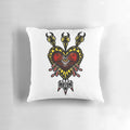 Graphic tattoo-inspired heart and arrow design printed on a soft, decorative pillow.