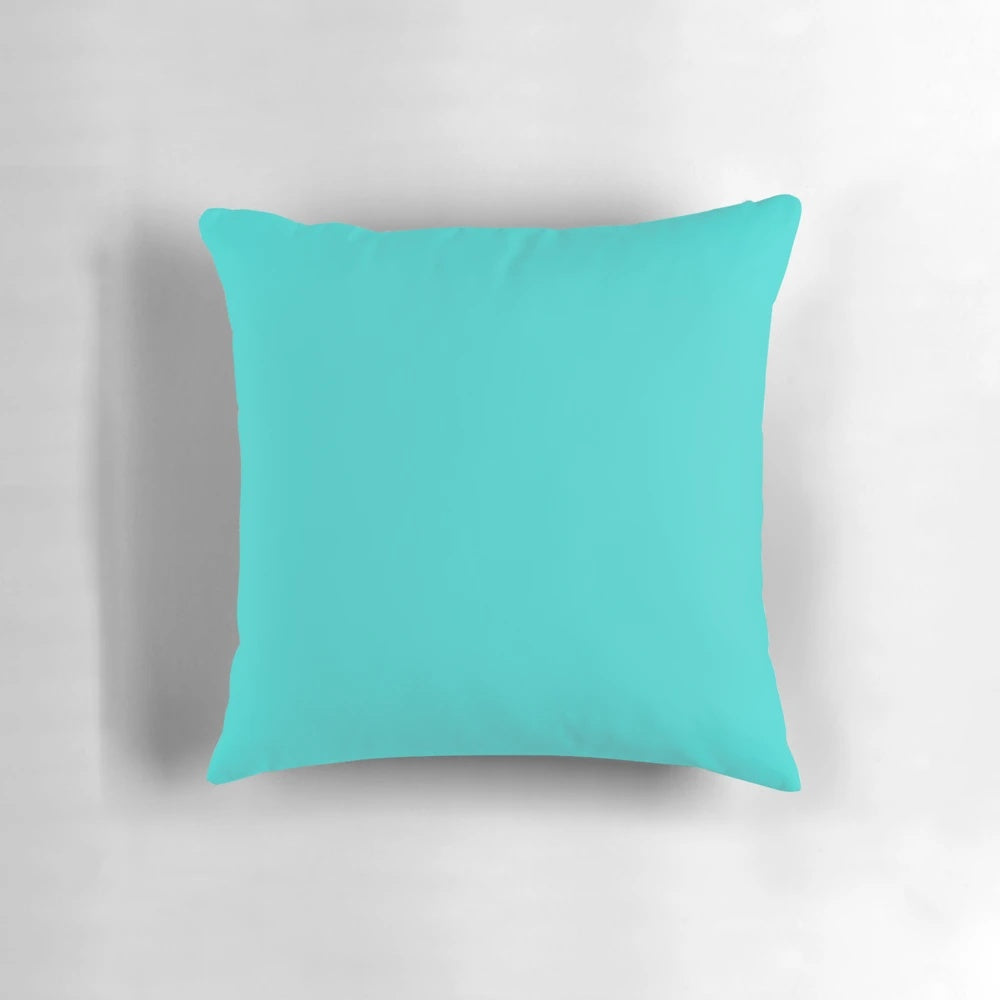 Soft, plush decorative pillow in teal and turquoise shades for boho chic home decor