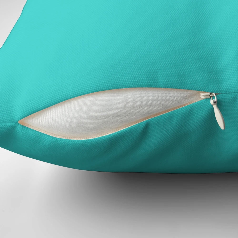Soft, plush decorative pillow in teal and turquoise shades for boho chic home decor