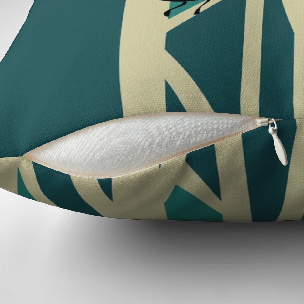 Throw pillow featuring a graphic design of tui and fantail birds perched on trees, a traditional New Zealand nature motif