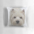 A soft, white decorative pillow featuring a Westie-inspired design.