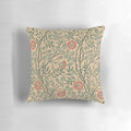 Decorative pillow featuring a floral design inspired by the iconic artwork of William Morris.