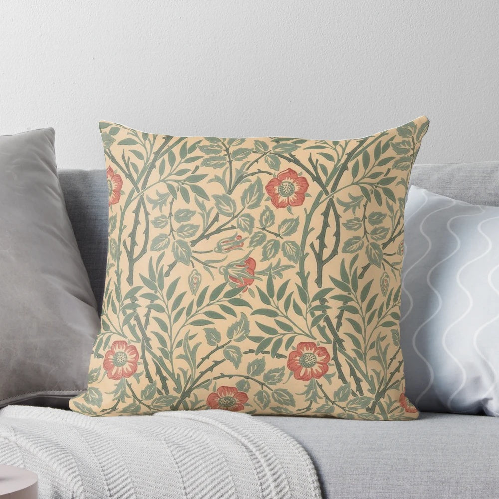 Decorative pillow featuring a floral design inspired by the iconic artwork of William Morris.