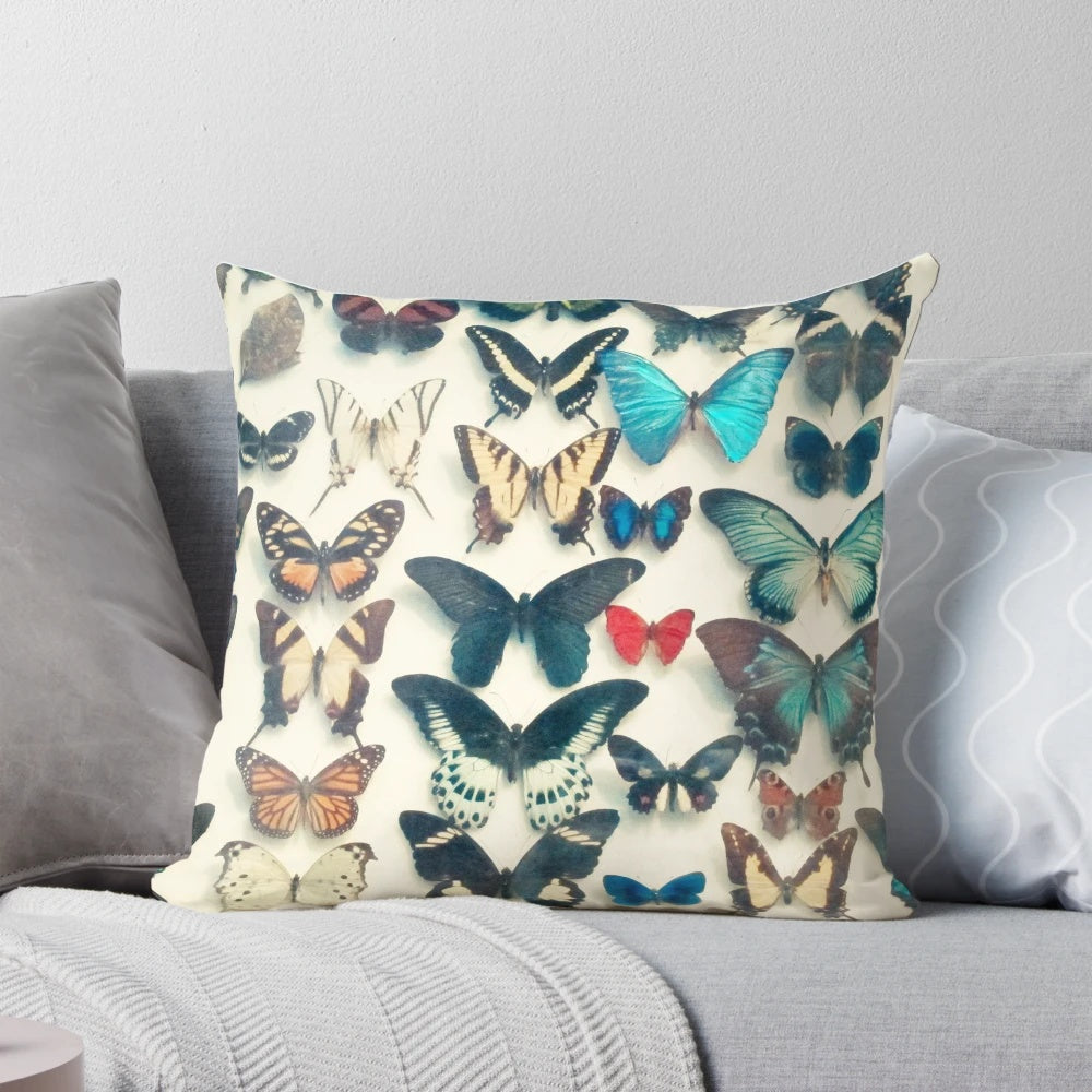 Colorful butterfly wings-inspired decorative pillow with a bold, textured design